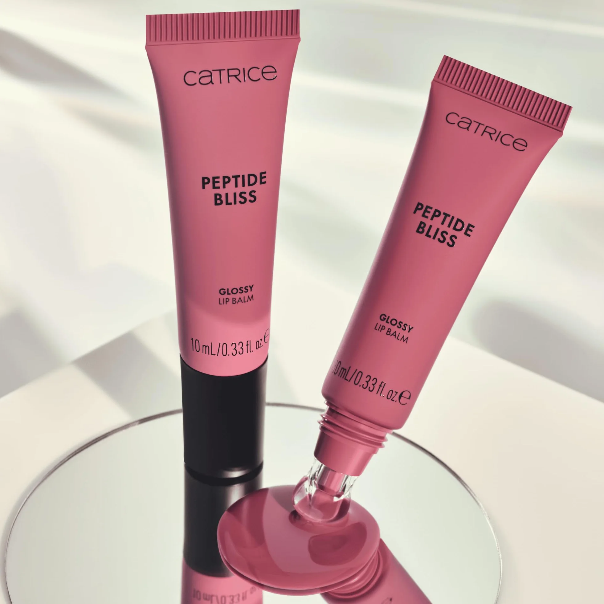 Catrice Lśniący balsam do ust Peptide Bliss Glosyy Lip Balm, nawilżanie, opieka, błyszczący, zroszony (10ml)