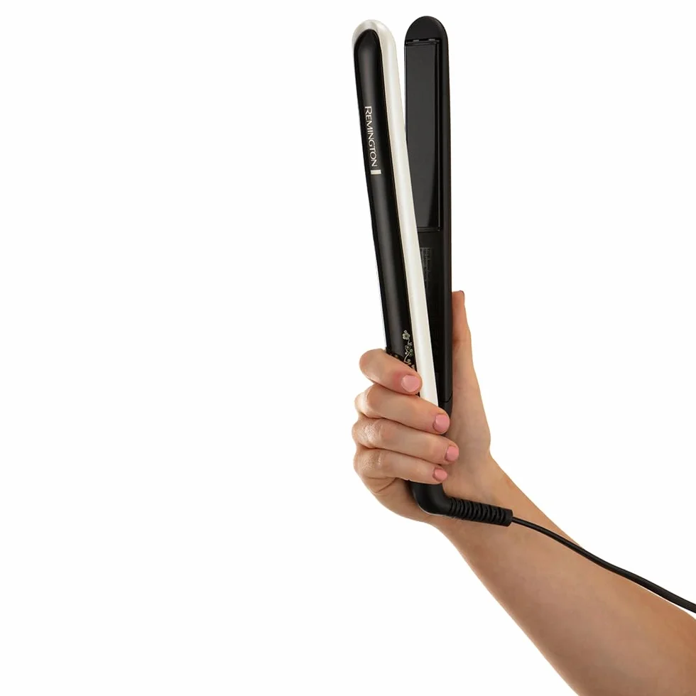 Remington prostownica do włosów, powłoka ceramiczna z perłami, zakres temp. 150-235°C, szybkie nagrzewanie, ruchome płytki, obrotowy przewód 3m, blokada płytek, etui, czarno-biała, Pearl Pro S9501
