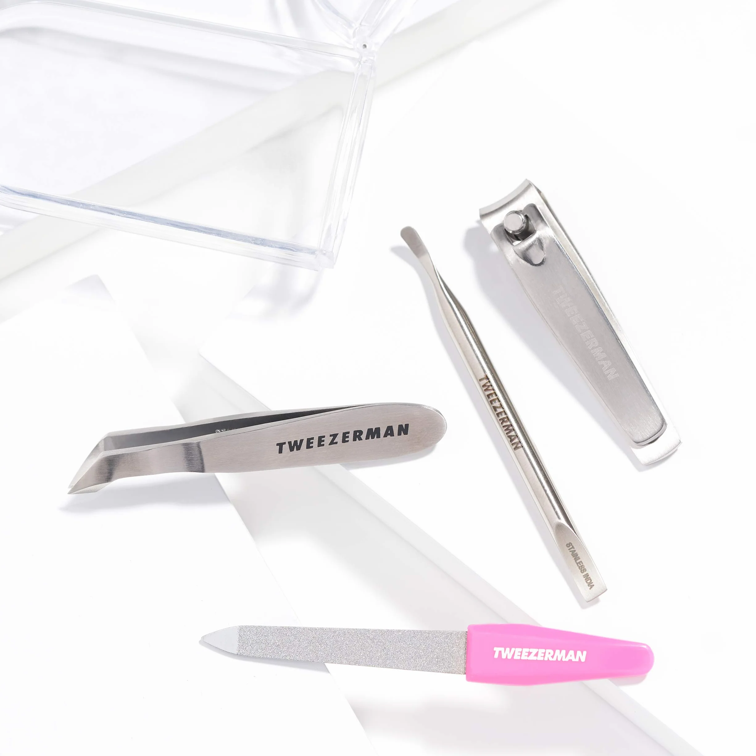 TWEEZERMAN Zestaw do manicure i pedicure (4 części, mini zestaw awaryjny, zestaw podróżny do każdej torebki, z cążkami i pilnikiem do paznokci), różowy